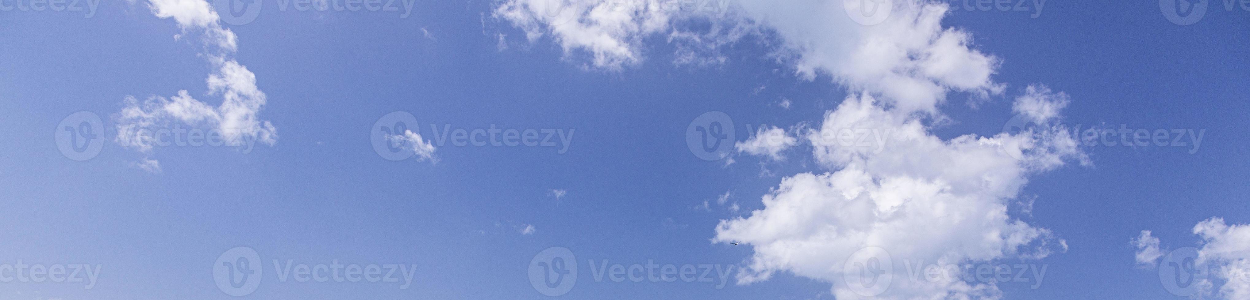 Image of a partly cloudy and partly clear sky during the day photo