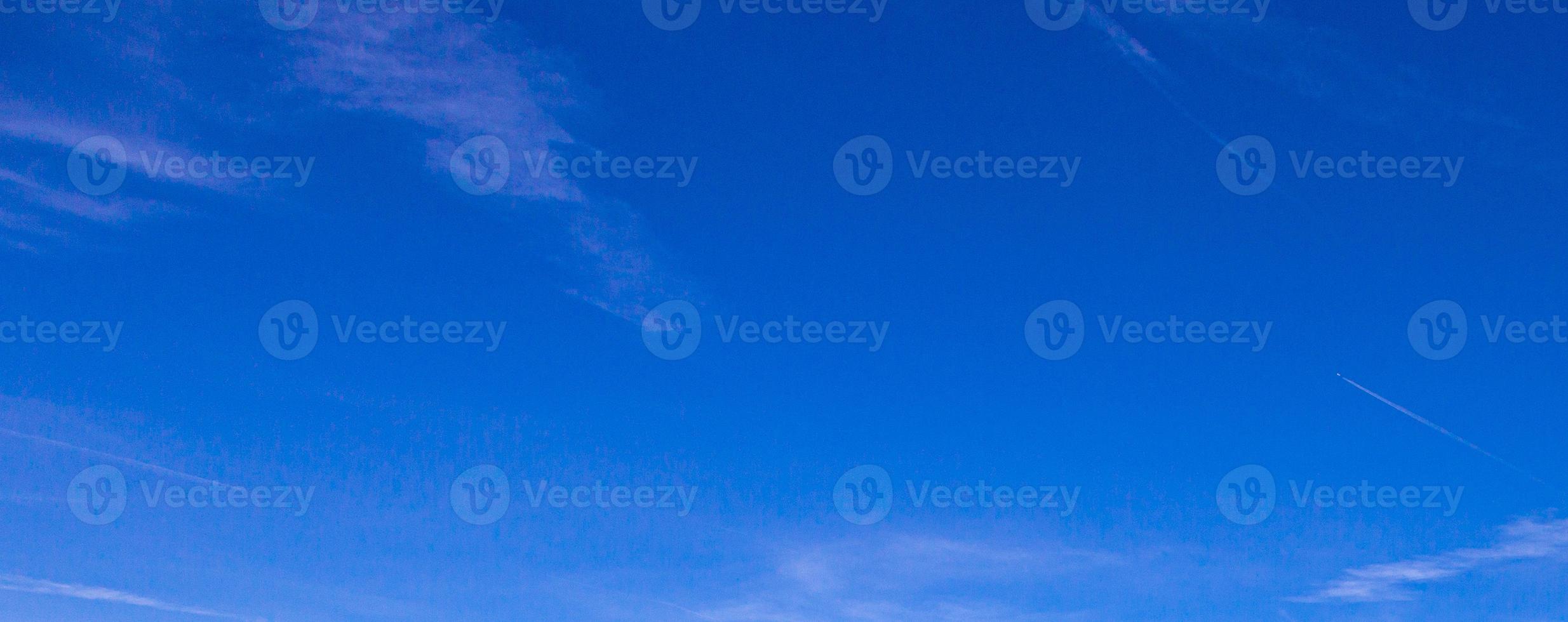 Image of a partly cloudy and partly clear sky during the day photo