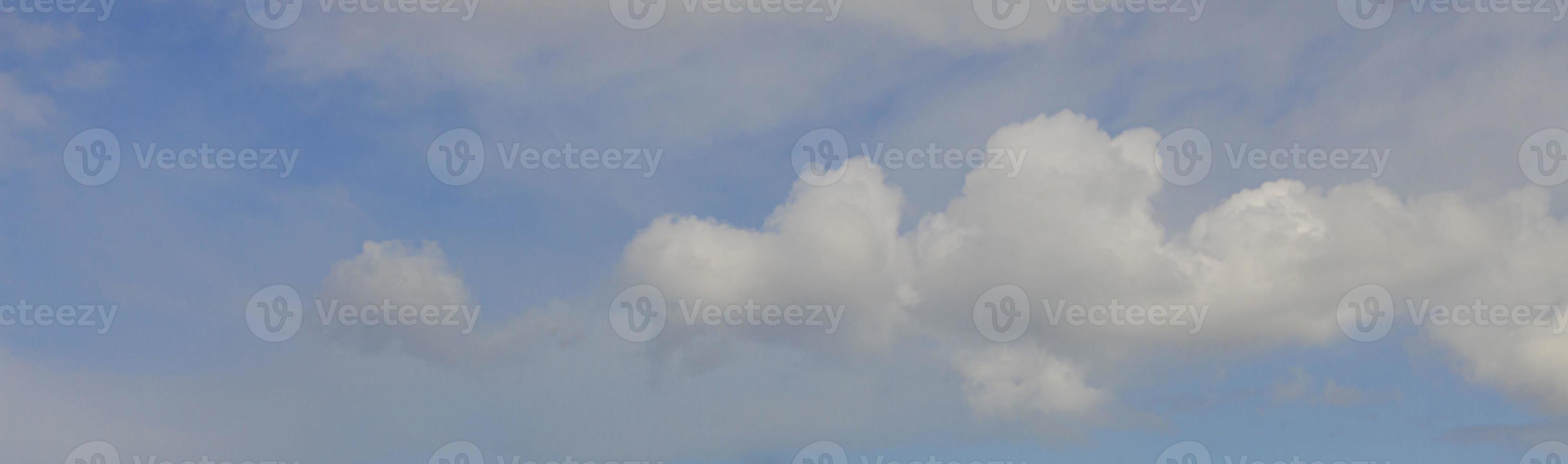 Image of a partly cloudy and partly clear sky during the day photo