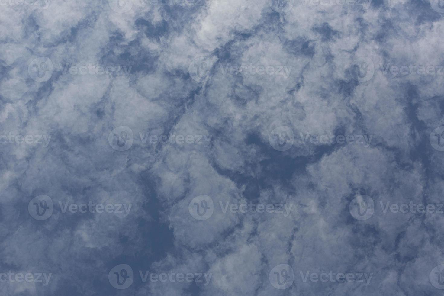 Image of a partly cloudy and partly clear sky during the day photo