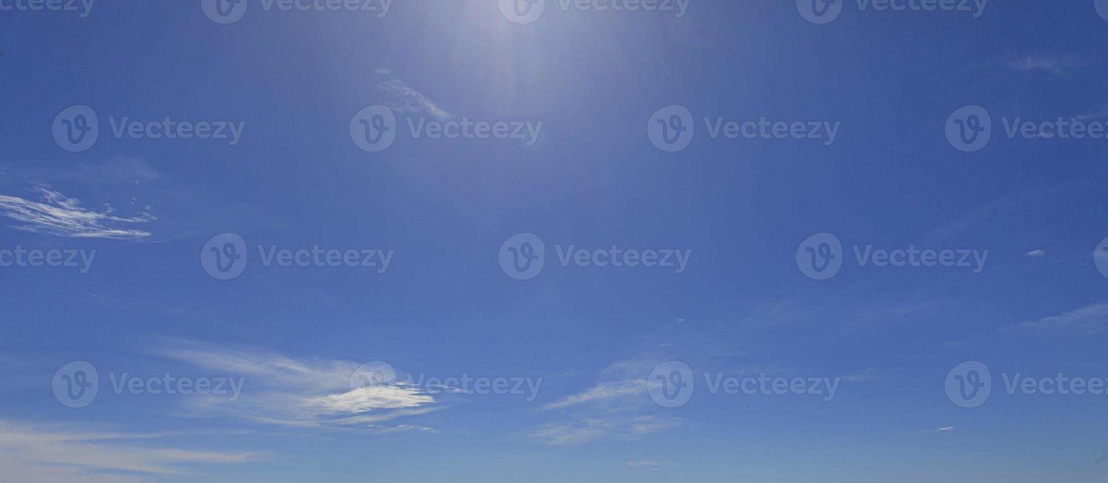 Image of a partly cloudy and partly clear sky during the day photo