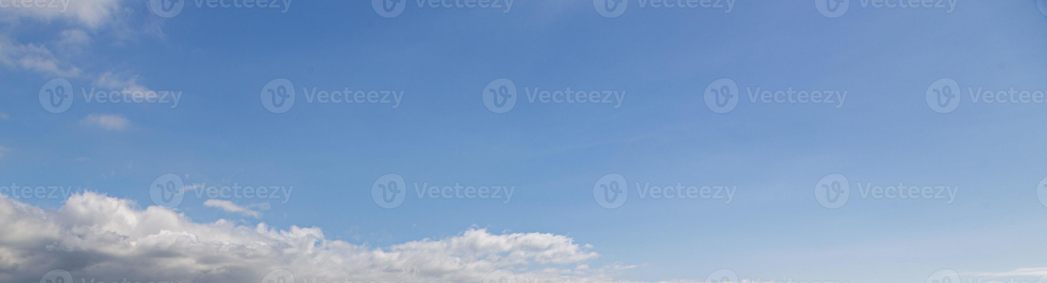 Image of a partly cloudy and partly clear sky during the day photo