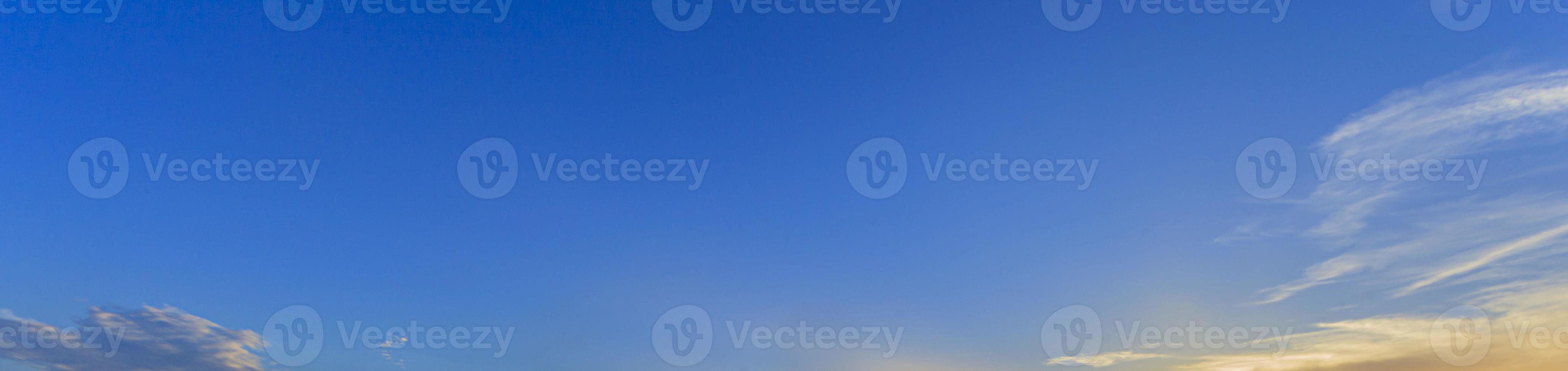 Dramatic colorful sky with afterglow and illuminated clouds photo