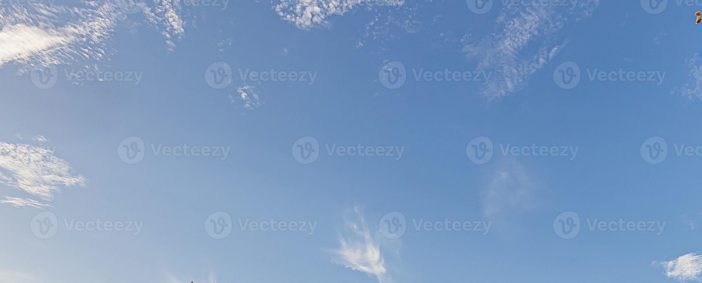 Image of a partly cloudy and partly clear sky during the day photo