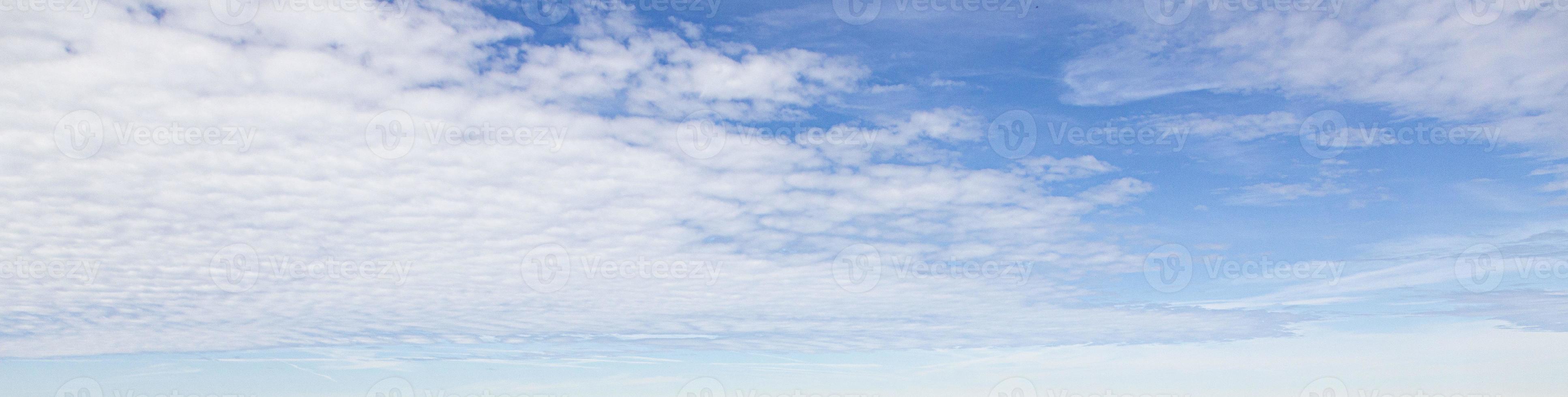 Image of a partly cloudy and partly clear sky during the day photo