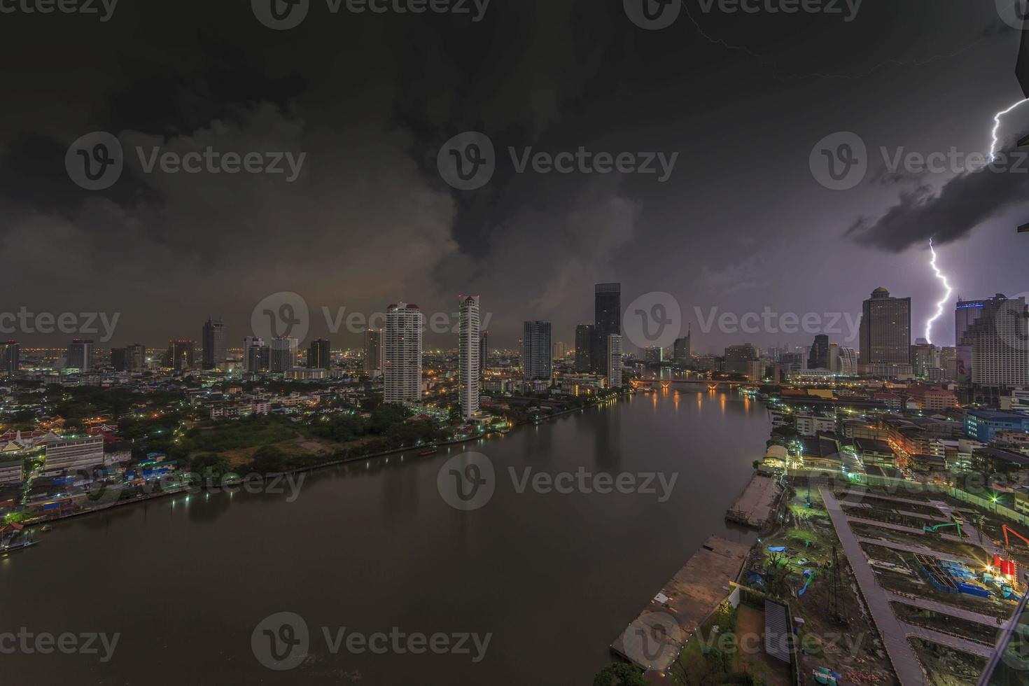 Aerial view of lightning strike in nightly Bangkok skyline photo