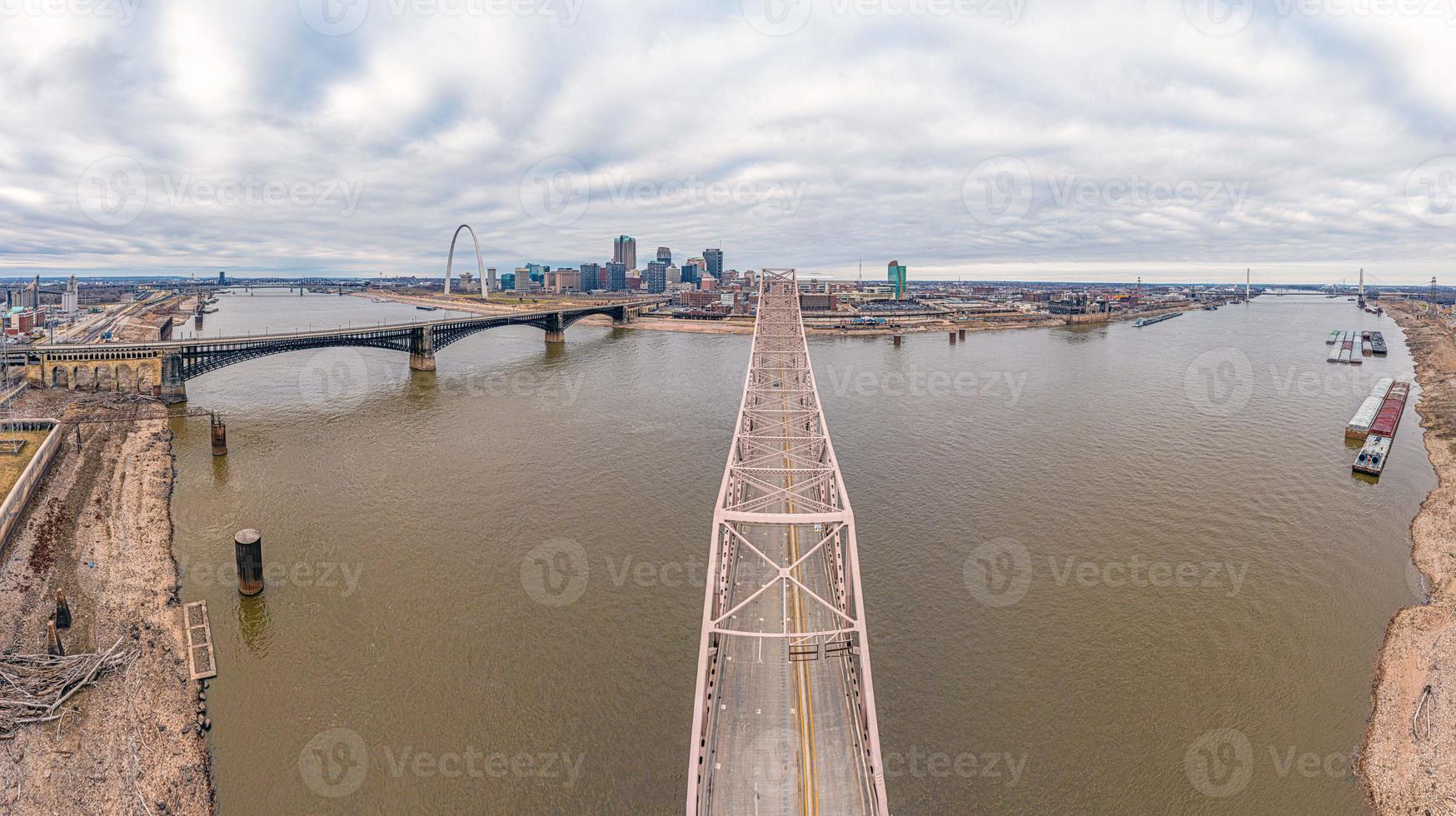 Drone panorama over St. Louis skyline and Mississippi River with Gateway Arch during daytime photo