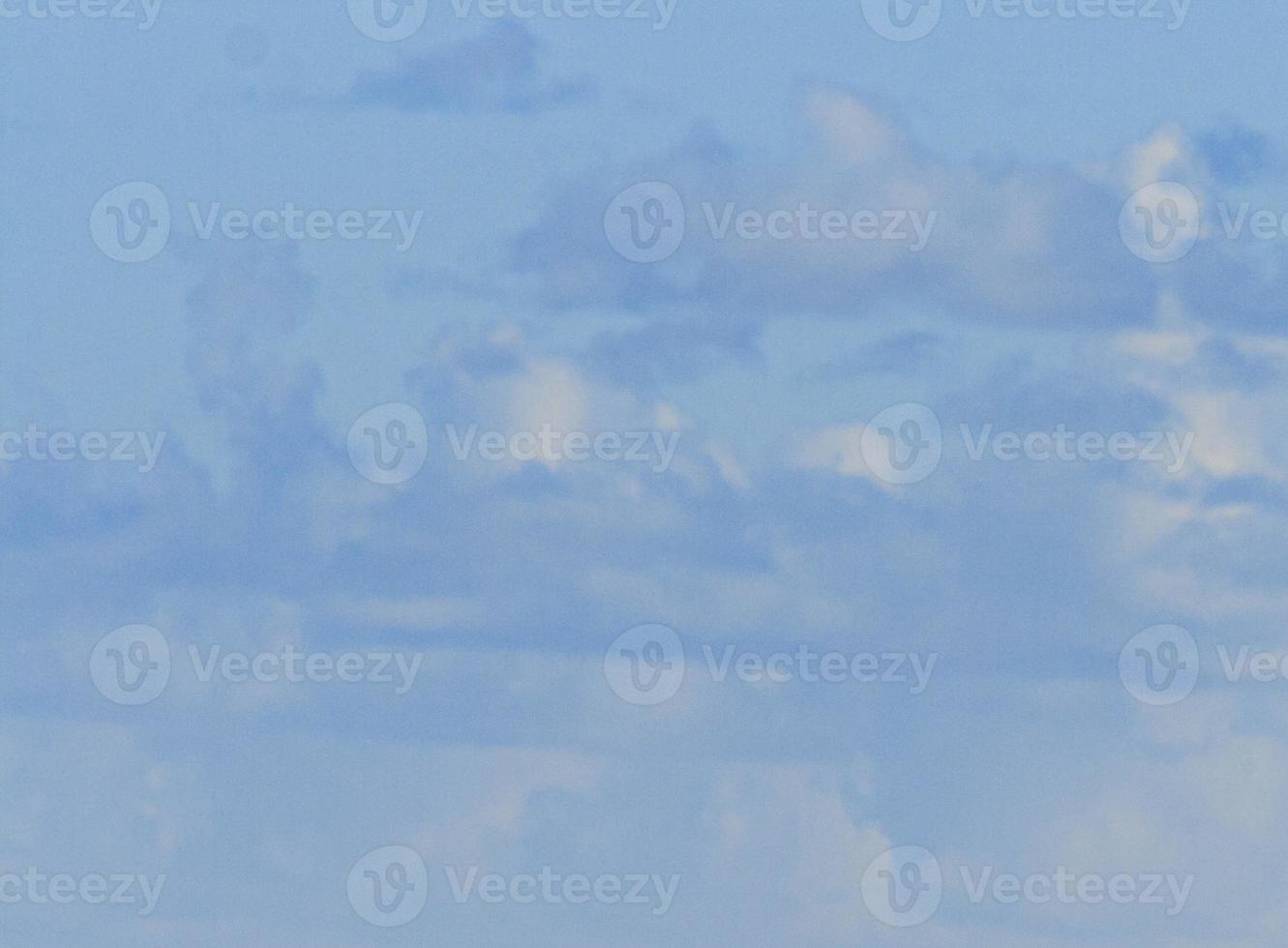 Image of a partly cloudy and partly clear sky during the day photo