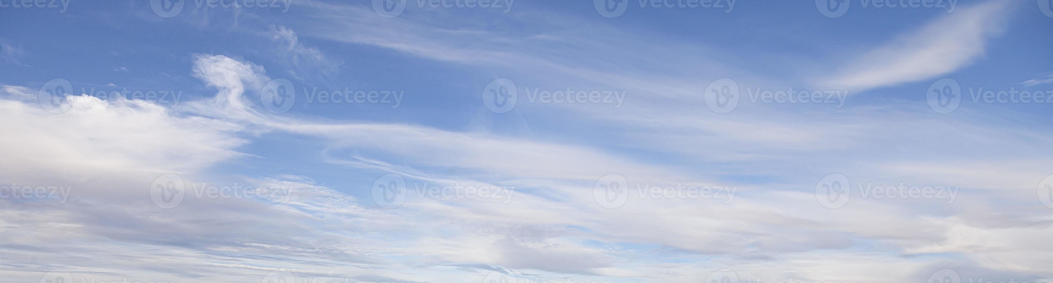 Image of a partly cloudy and partly clear sky during the day photo