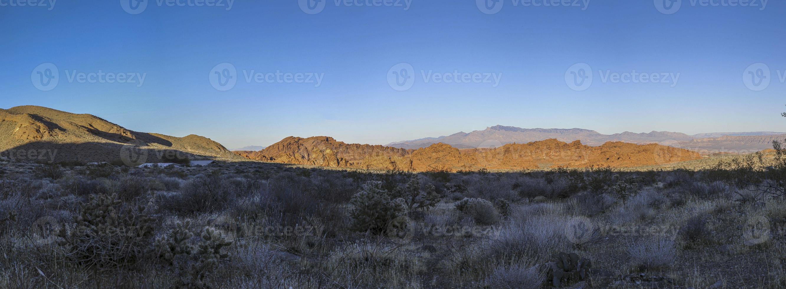 Panoramic picture of deep red colored rock formations in the Valley of Fire state park near Las Vegas in winter photo