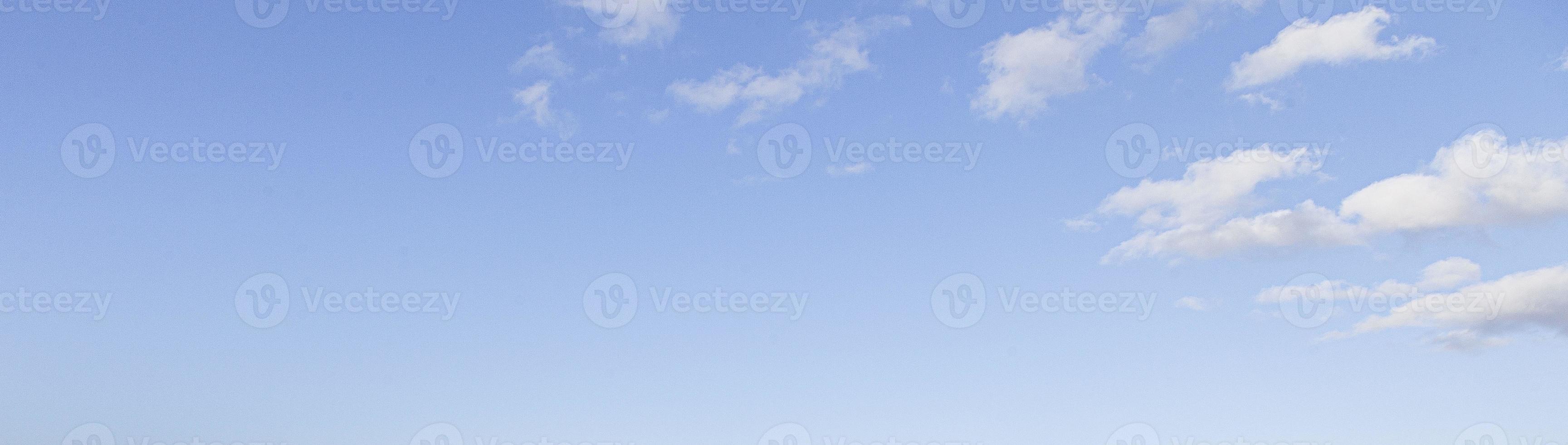 Image of a partly cloudy and partly clear sky during the day photo