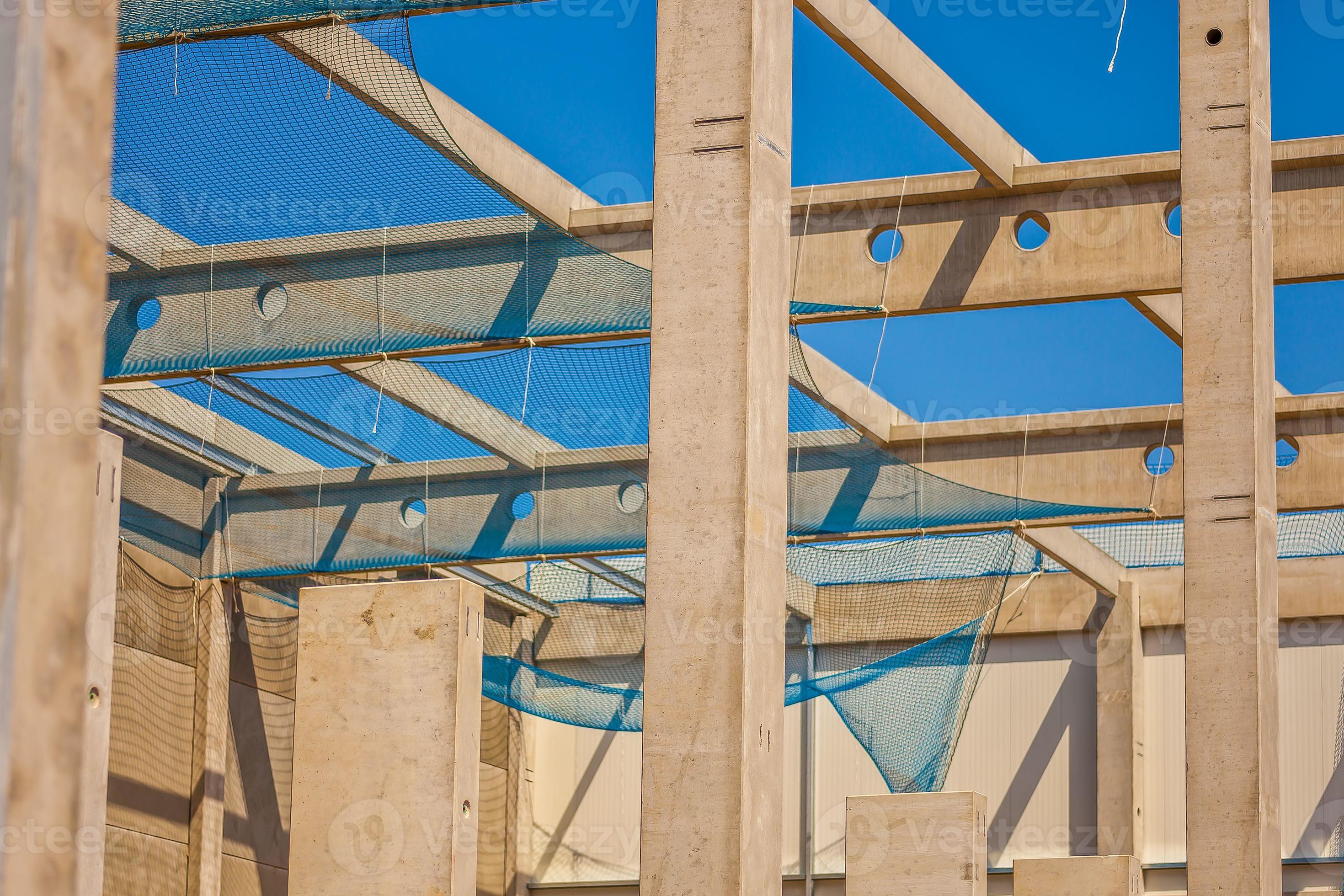 Construction site with precast concrete columns, beams and walls