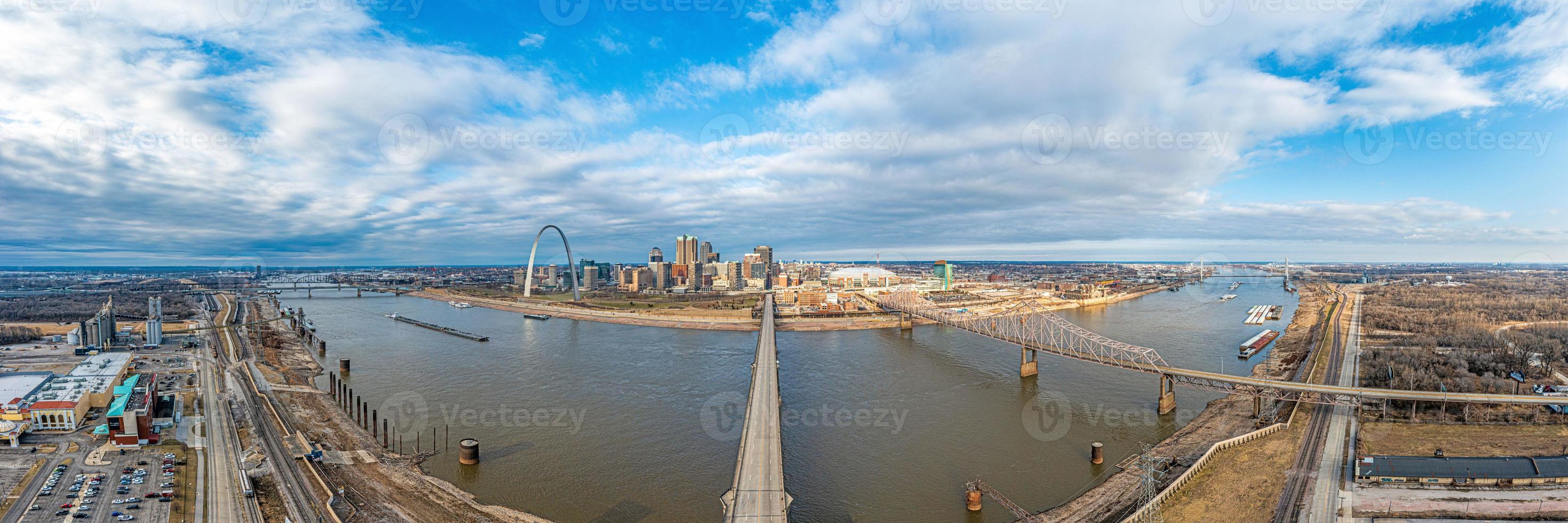 Drone panorama over St. Louis skyline and Mississippi River with Gateway Arch during daytime photo