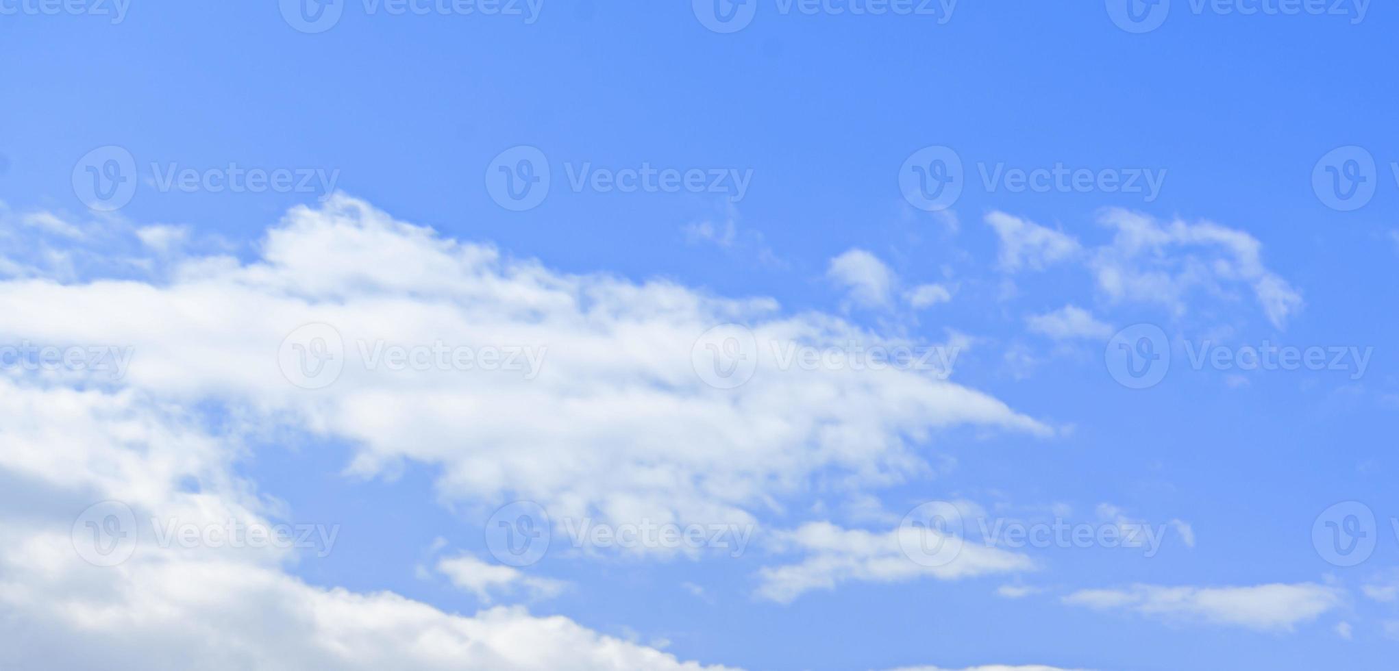 Image of a partly cloudy and partly clear sky during the day photo