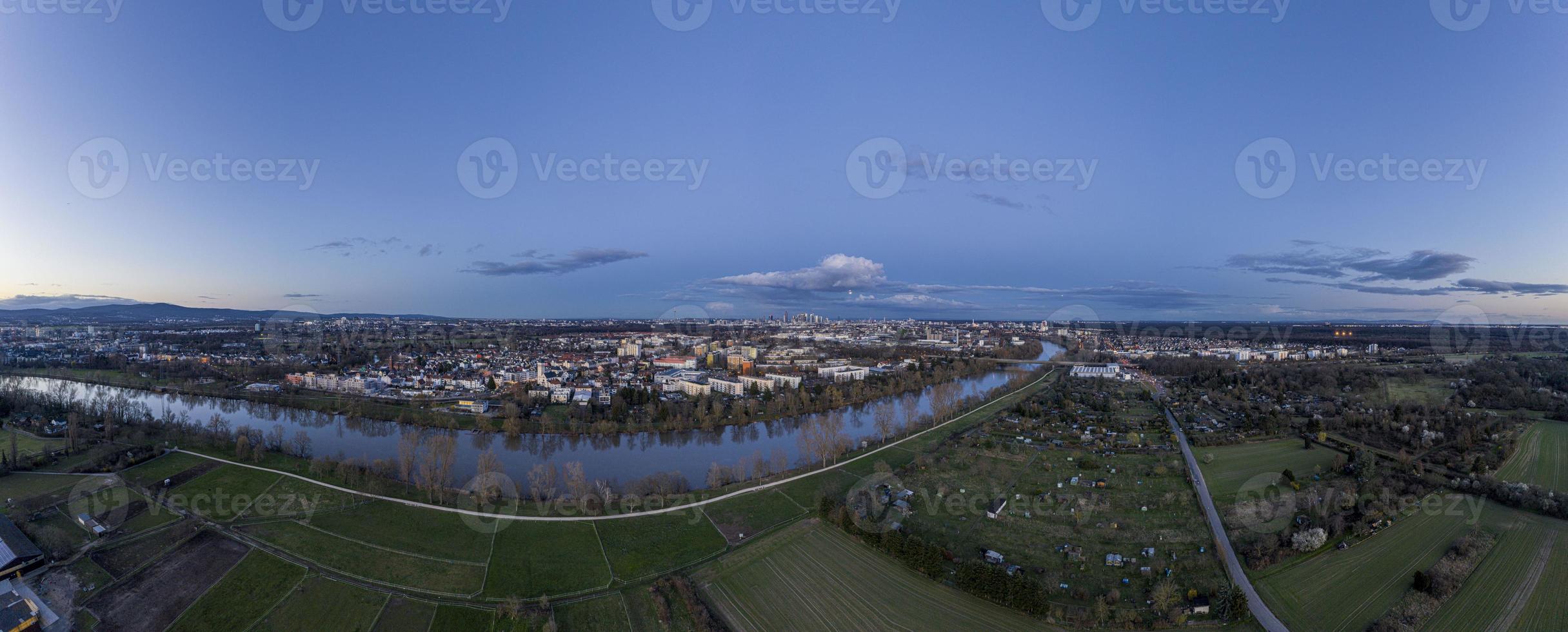 Aerial panoramic picture of river Main and the Frankfurt skyline during sunset in winter photo