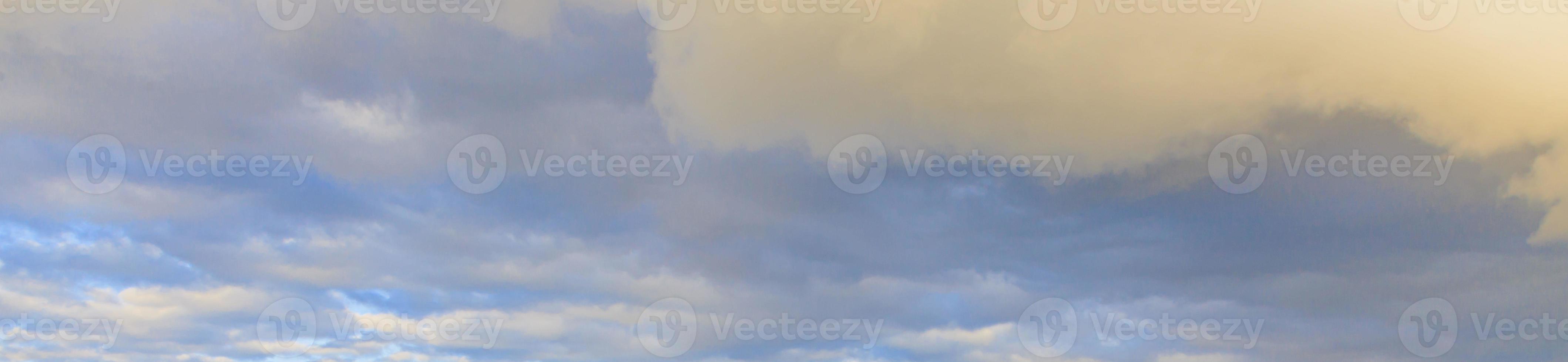 Image of a partly cloudy and partly clear sky during the day photo