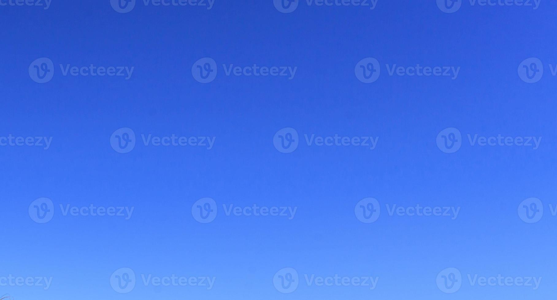 Image of a clear and cloudless sky can be used as background photo