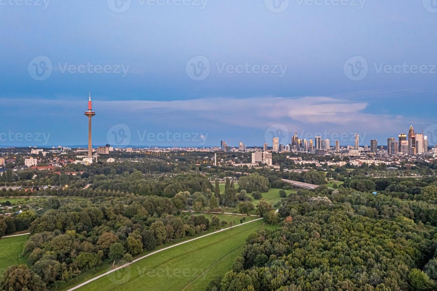 Drone panorama over Frankfurt skyline in evening light taken from Niddapark photo