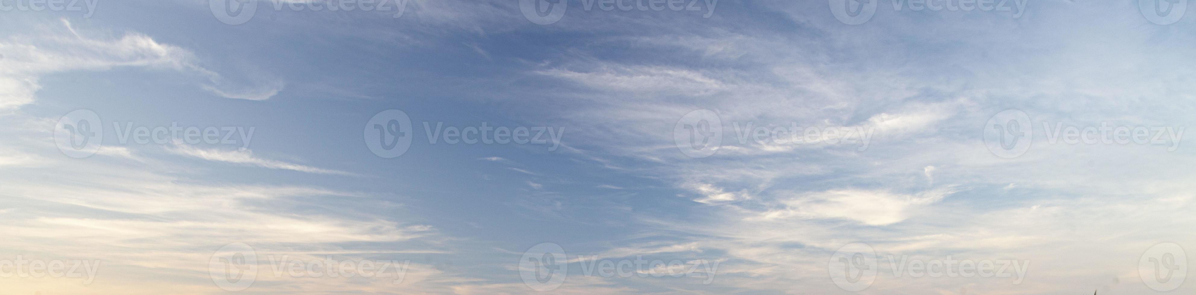 Image of a partly cloudy and partly clear sky during the day photo