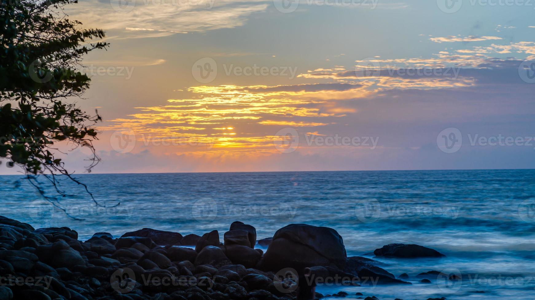 Picture of colorful sunset at Kamala beach in Thailand in summer photo