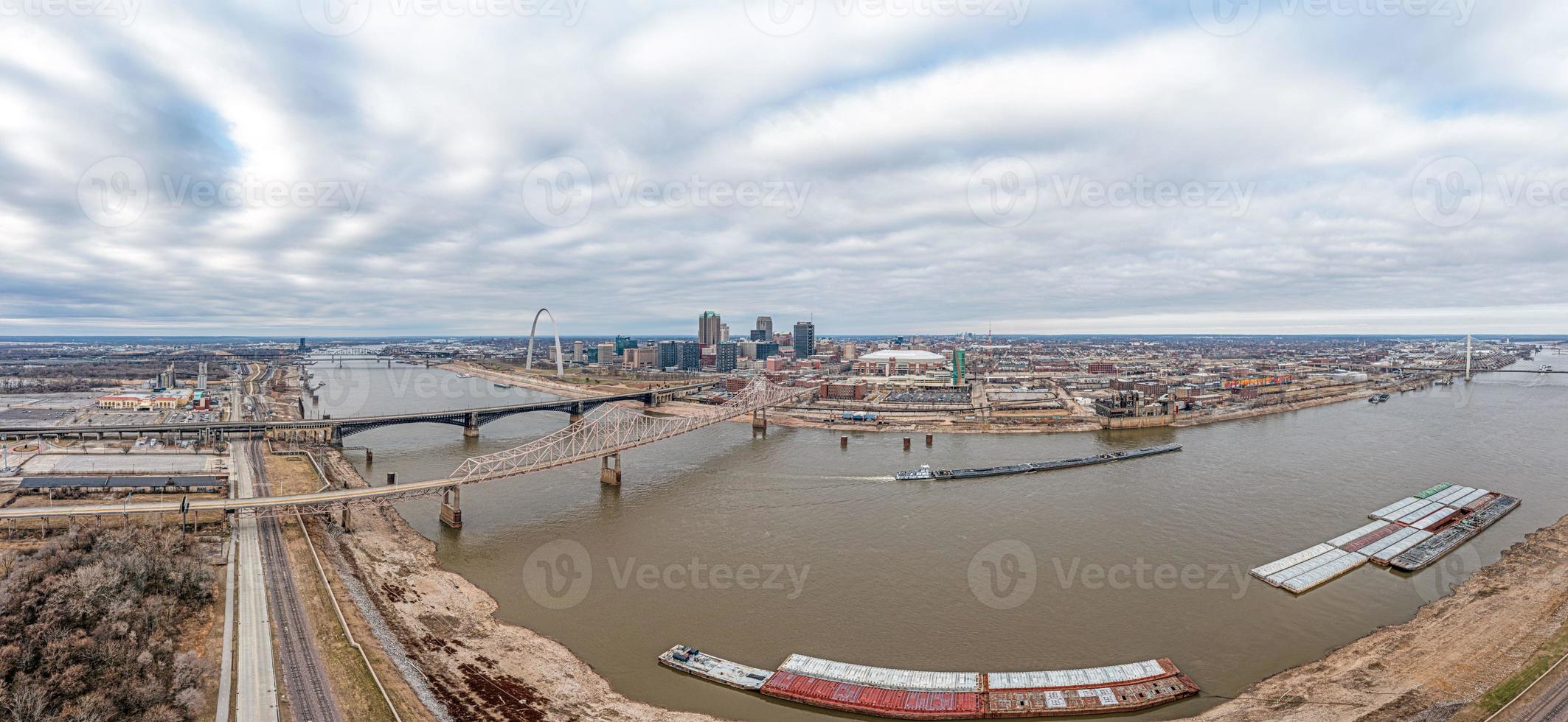 Drone panorama over St. Louis skyline and Mississippi River with Gateway Arch during daytime photo