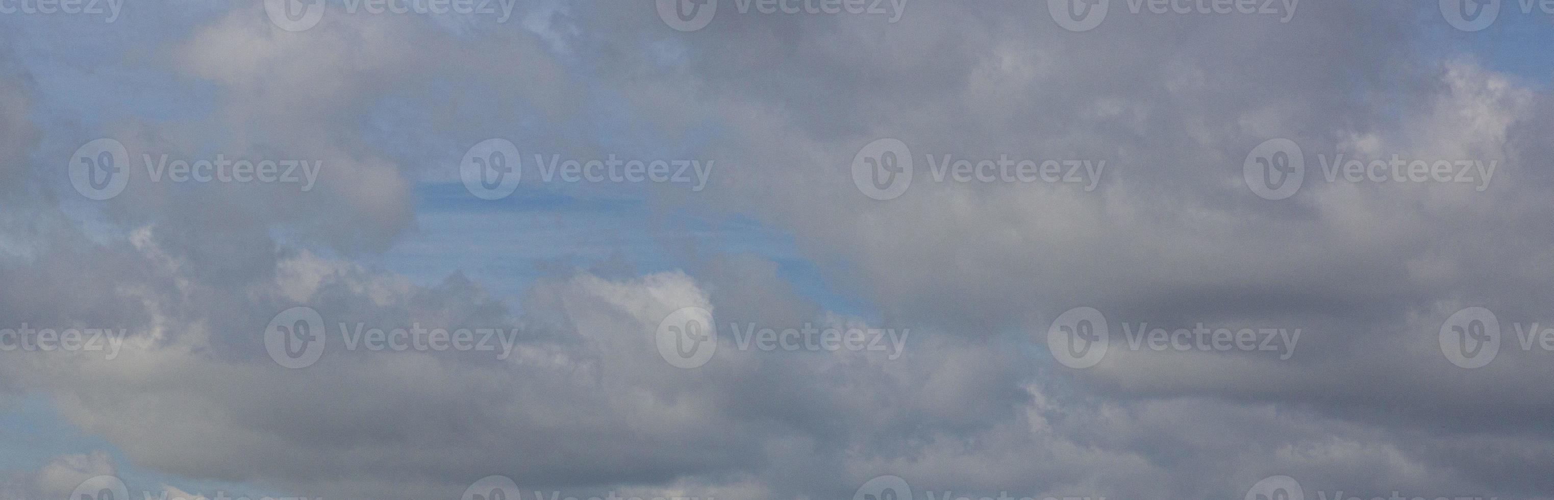 Image of a partly cloudy and partly clear sky during the day photo