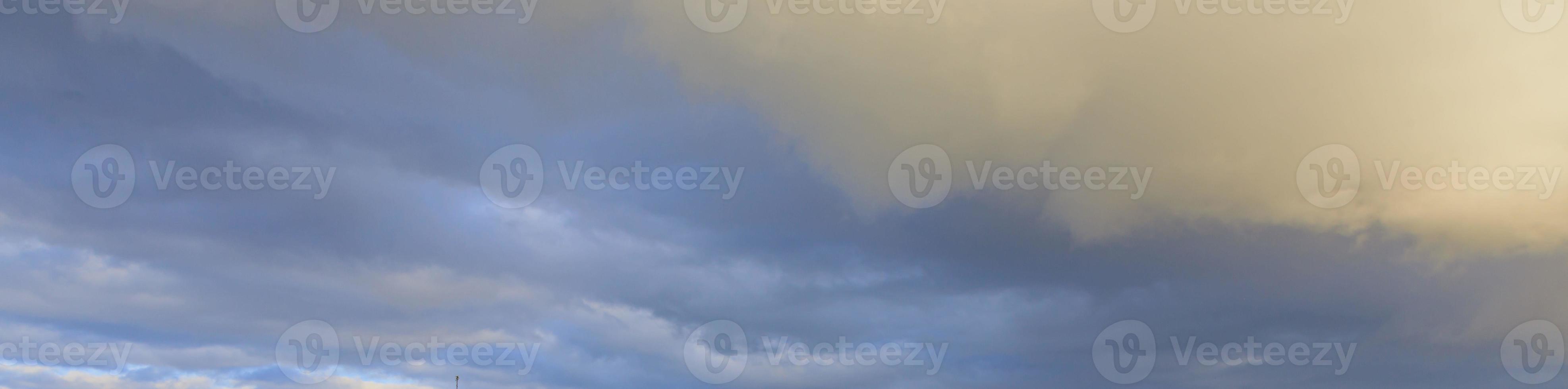 Image of a partly cloudy and partly clear sky during the day photo