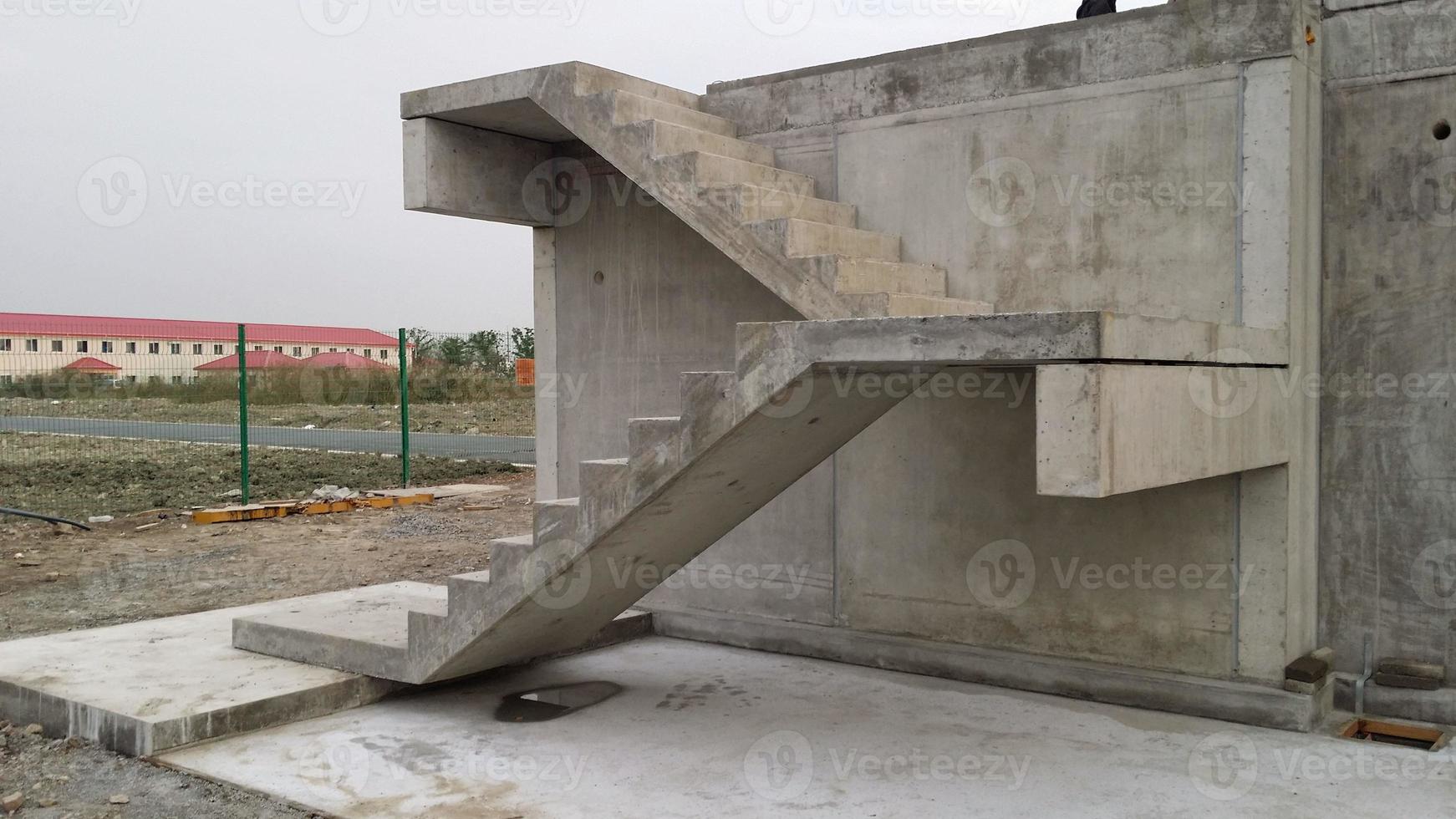 Picture of straight precast concrete stairs with landings completely installed on a building in the shell photo