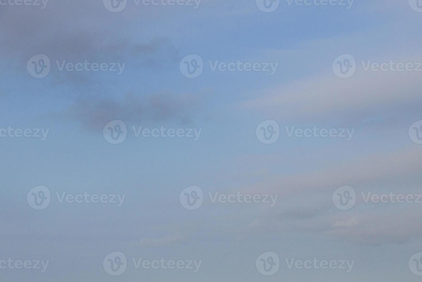 Image of a partly cloudy and partly clear sky during the day photo