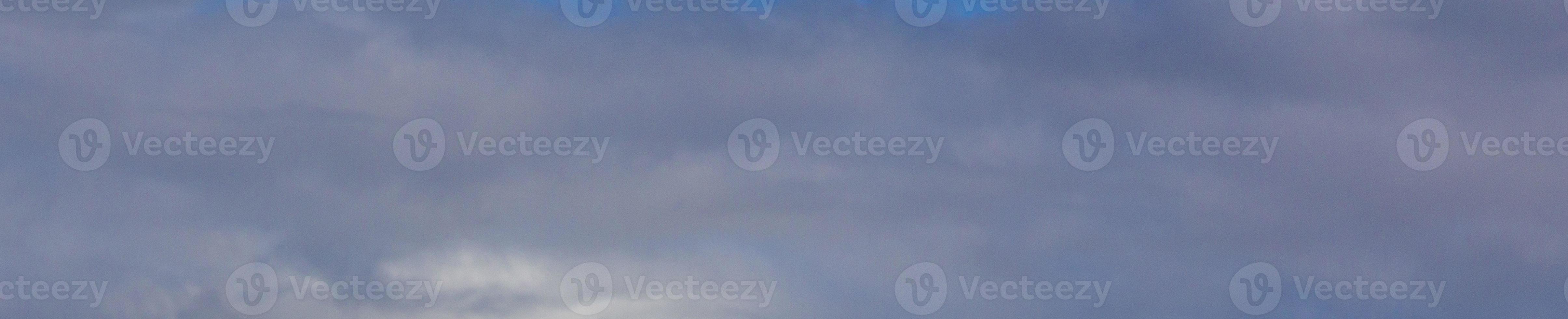 Image of a partly cloudy and partly clear sky during the day photo