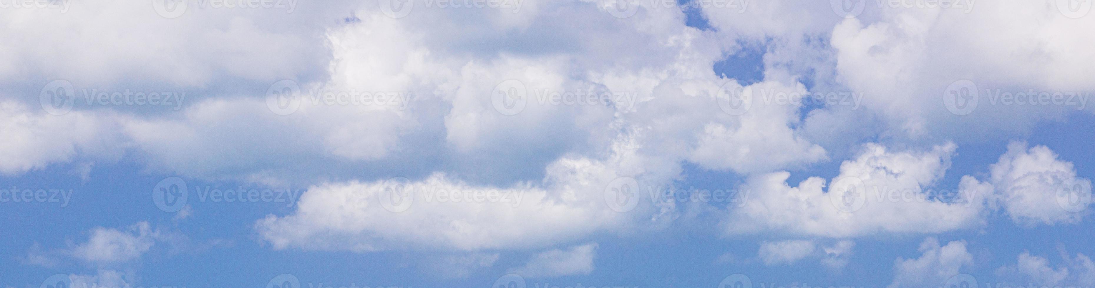 Image of a partly cloudy and partly clear sky during the day photo
