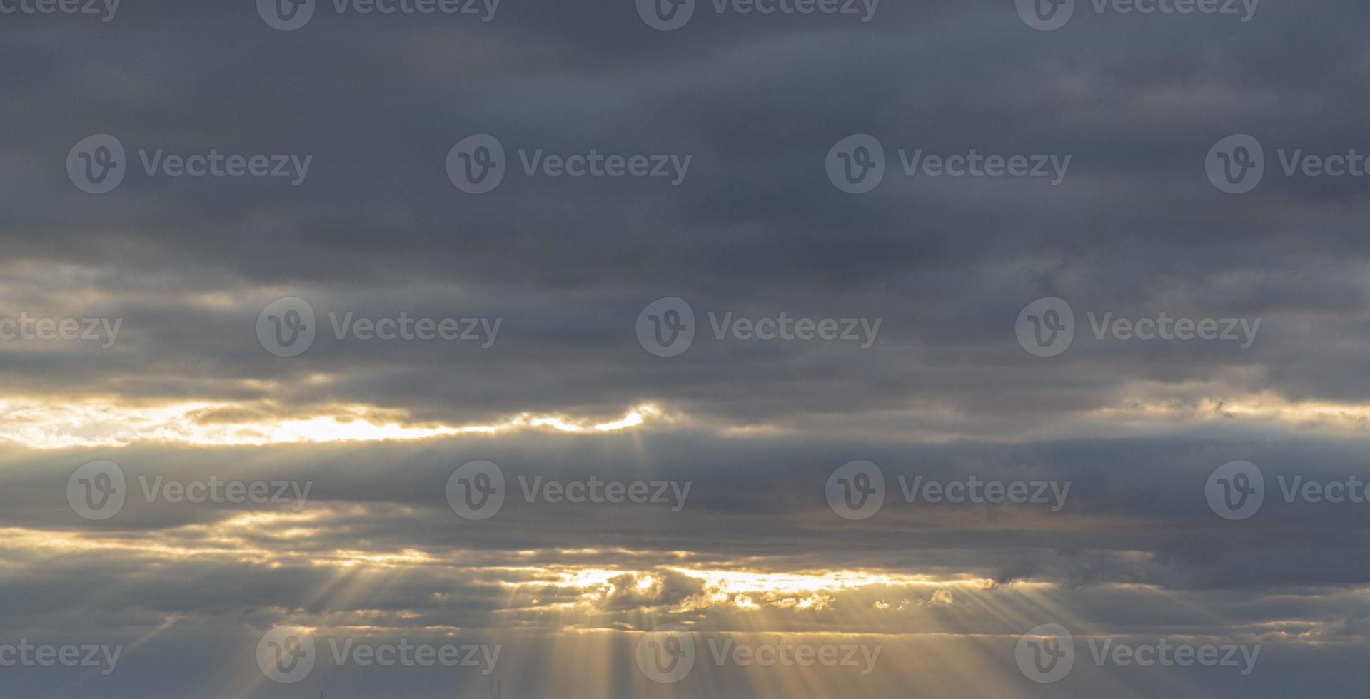 Dramatic colorful sky with afterglow and illuminated clouds photo