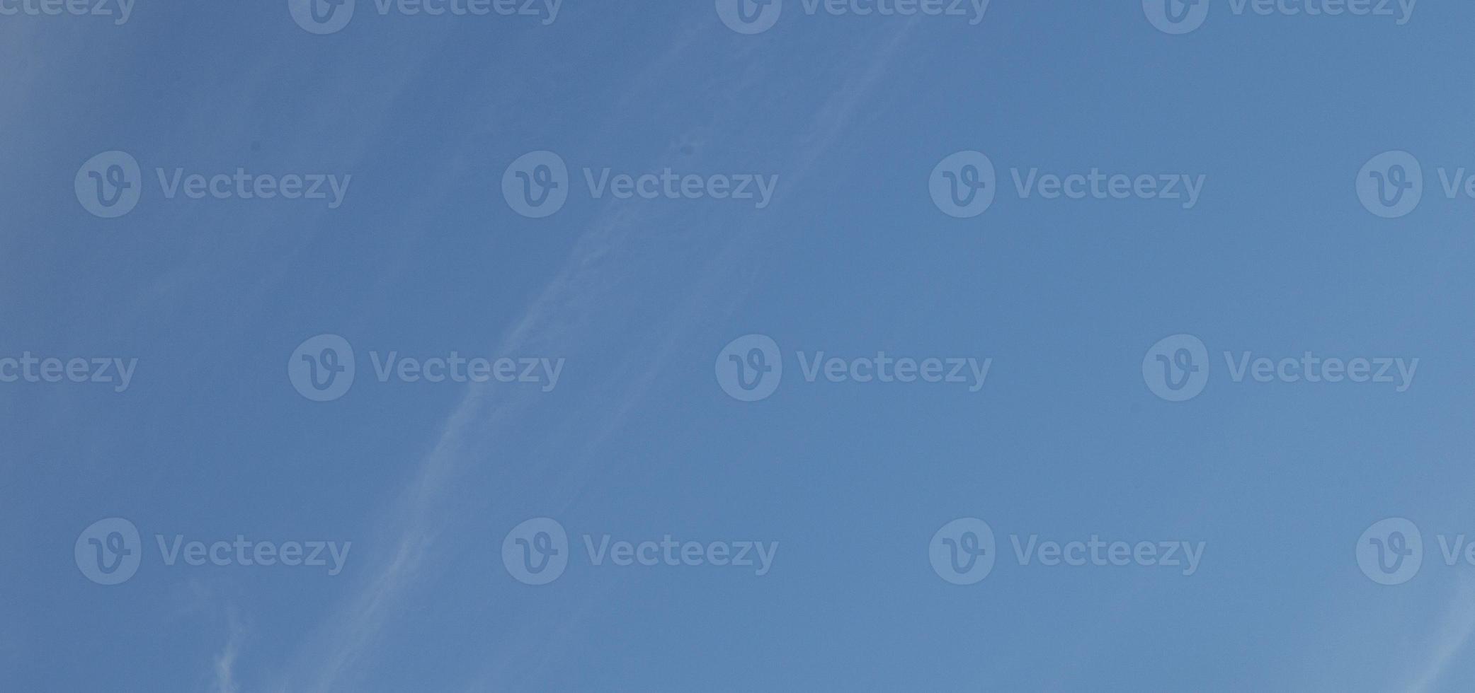 Image of a partly cloudy and partly clear sky during the day photo