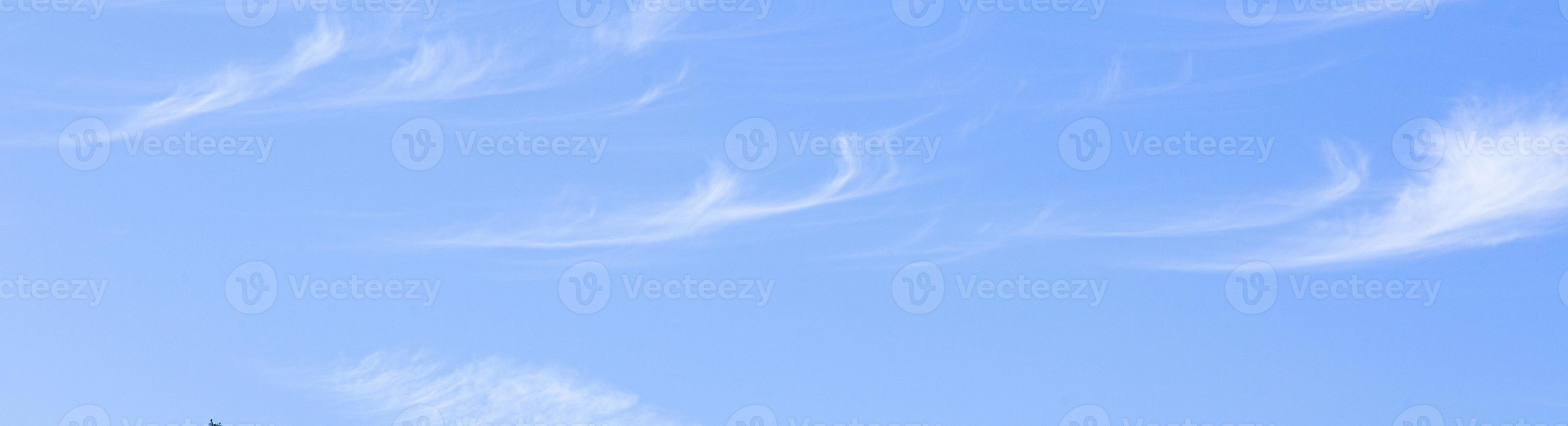 Image of a partly cloudy and partly clear sky during the day photo