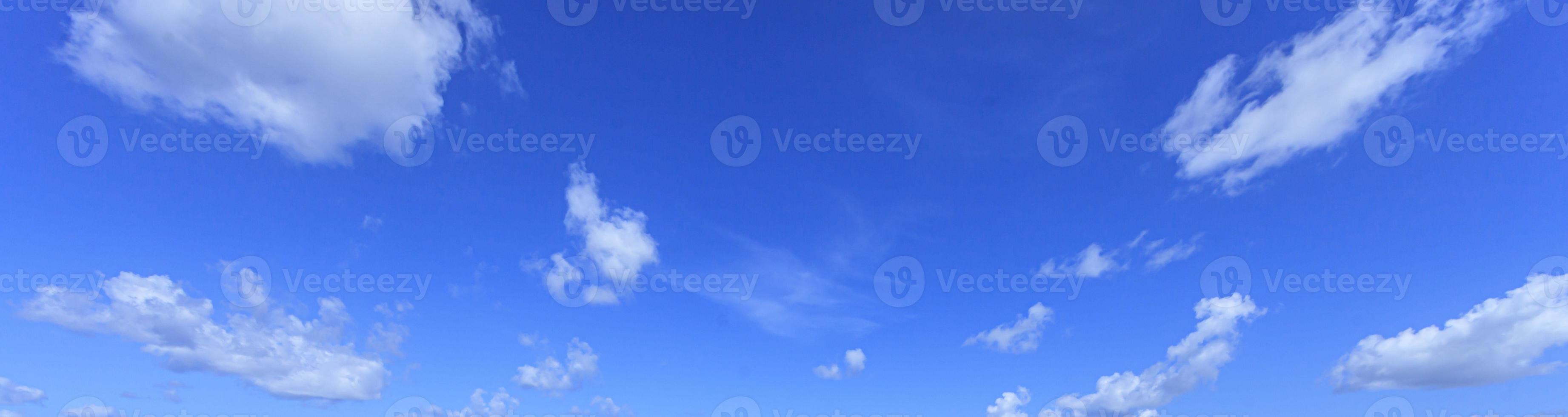 Image of a partly cloudy and partly clear sky during the day photo