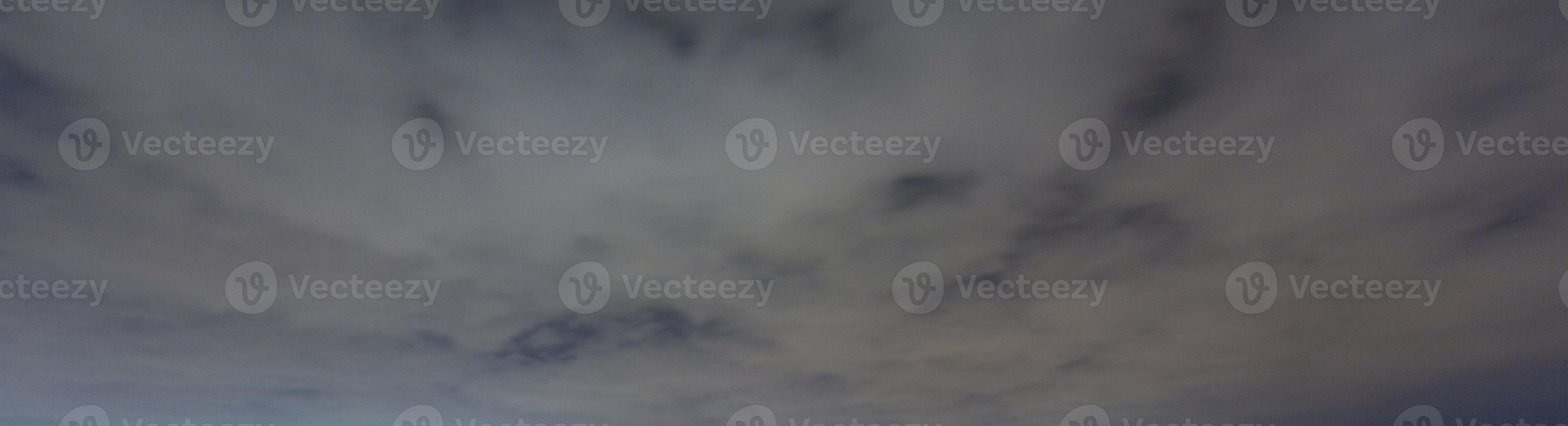 Image of a partly cloudy and partly clear sky during the day photo