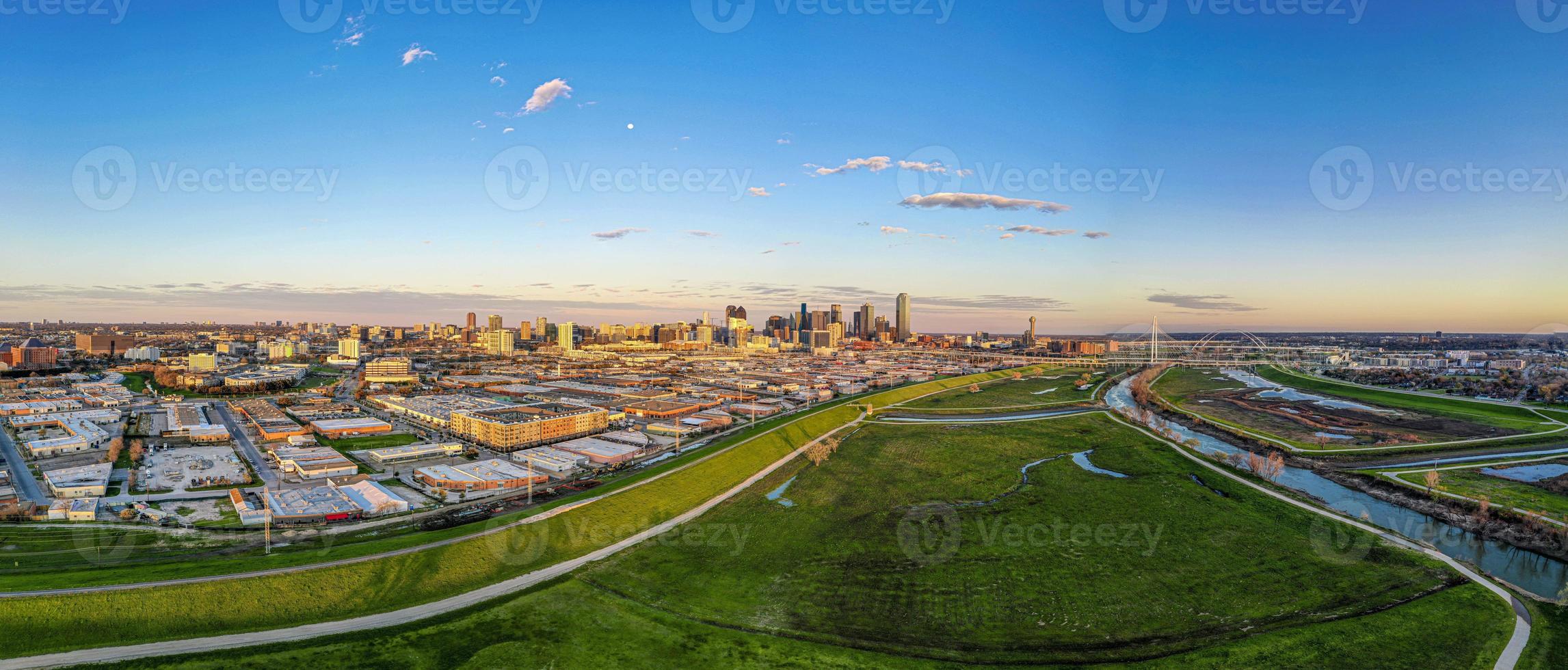 Panoramic aerial drone picture of Dallas skyline and Trammel Crow Park at sunset in winter photo