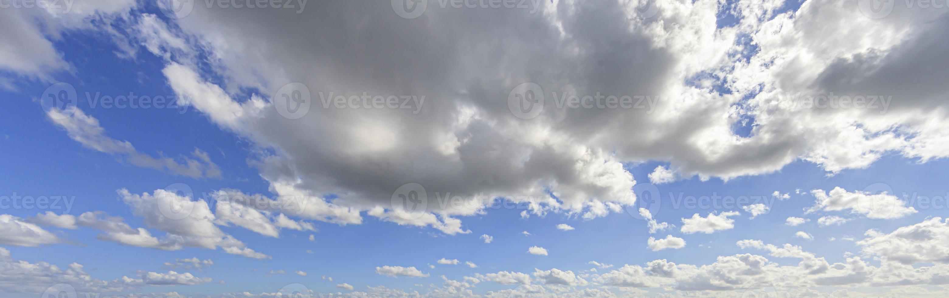 Image of a partly cloudy and partly clear sky during the day photo