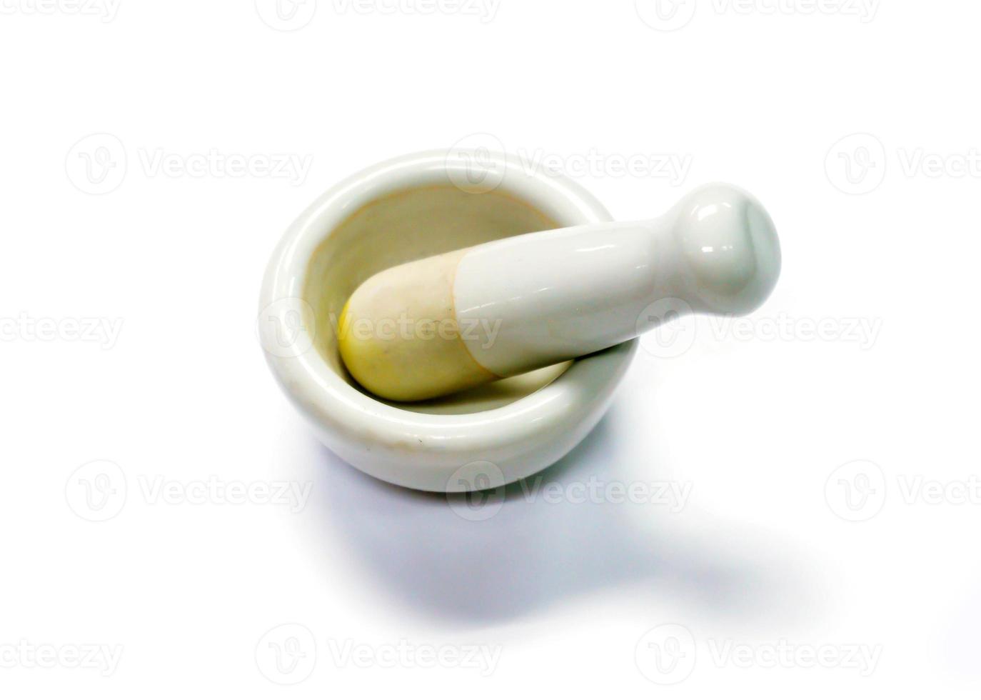 Herbs and medicine white mortars, Made by lime or ceramic on white background. photo