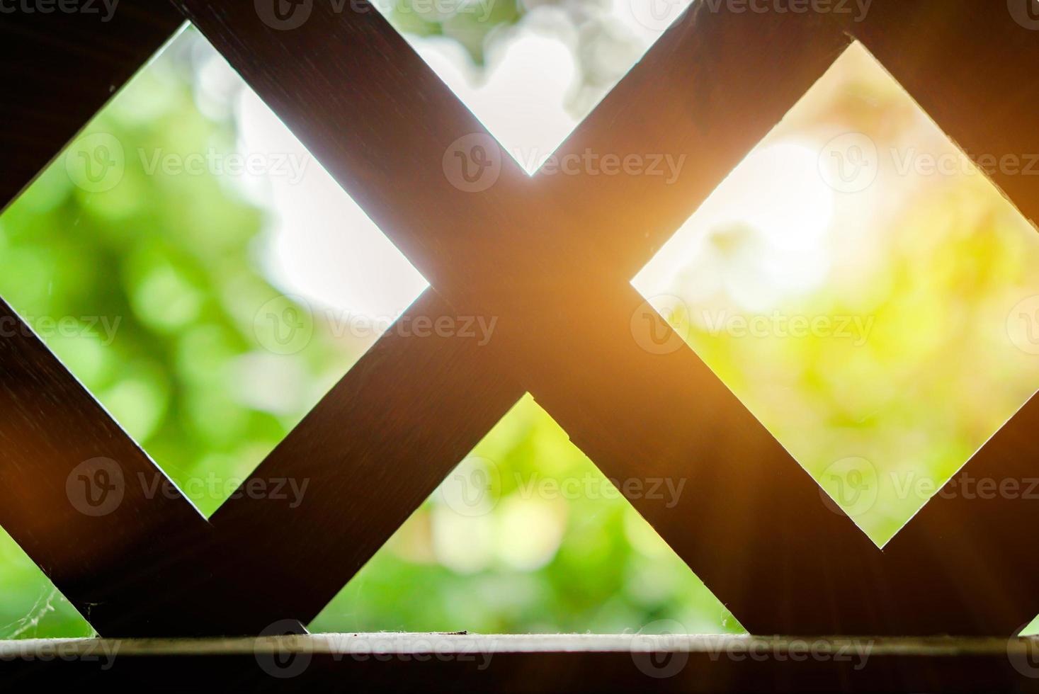 Blur and bokeh outside view of the house looked from inside and pass of house vent. photo