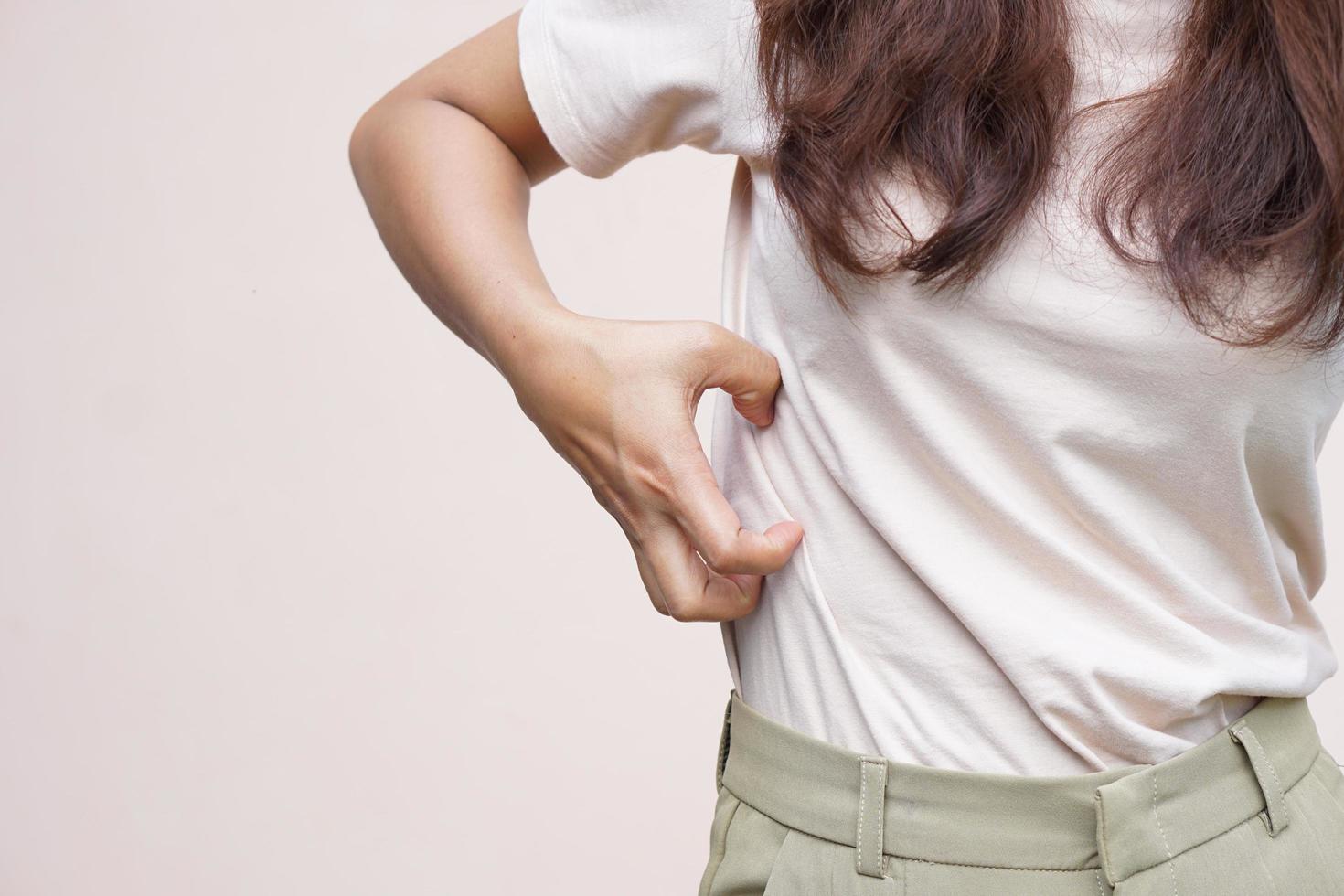 Woman suffer from stomachacheChronic gastritis Abdomen bloating concept photo