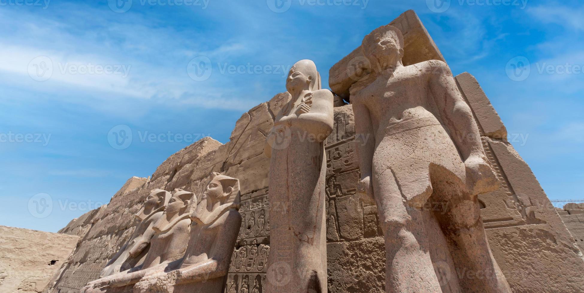 antique statue in the pillared hall in Luxor in Egypt photo