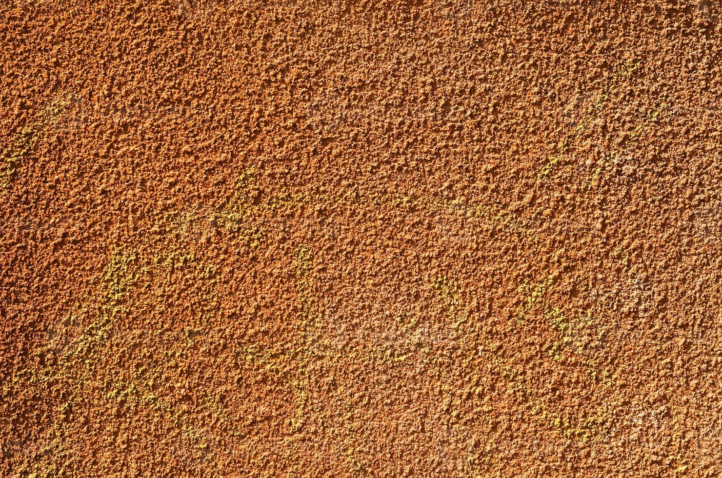 texture wall with orange plaster photo