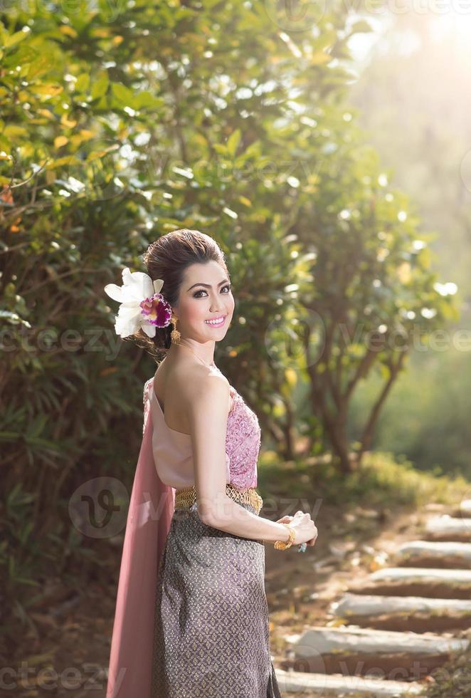 Beautiful Thai girl in Thai traditional costume photo