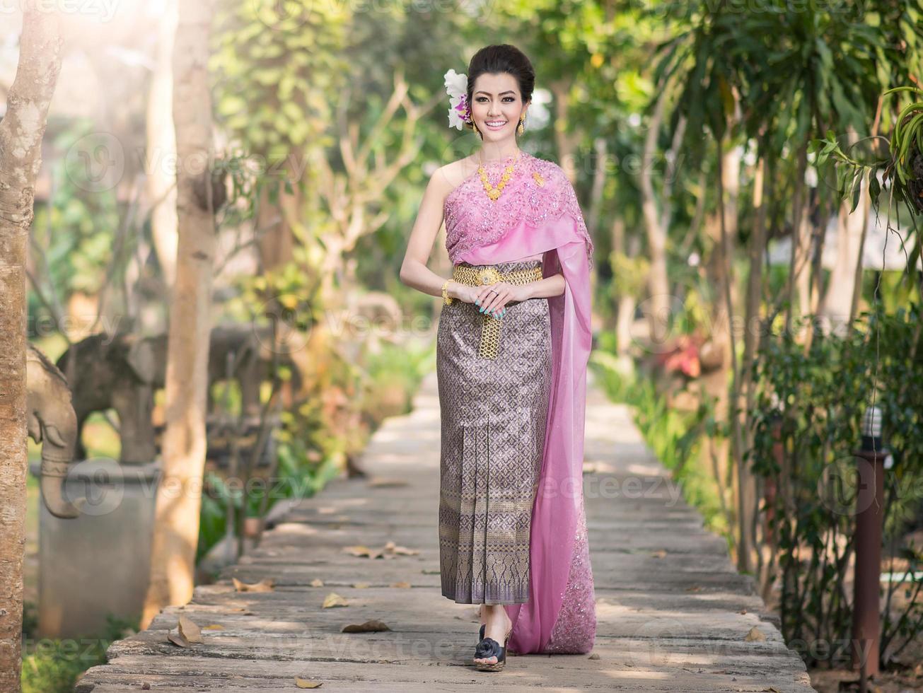 Beautiful Thai girl in Thai traditional costume photo