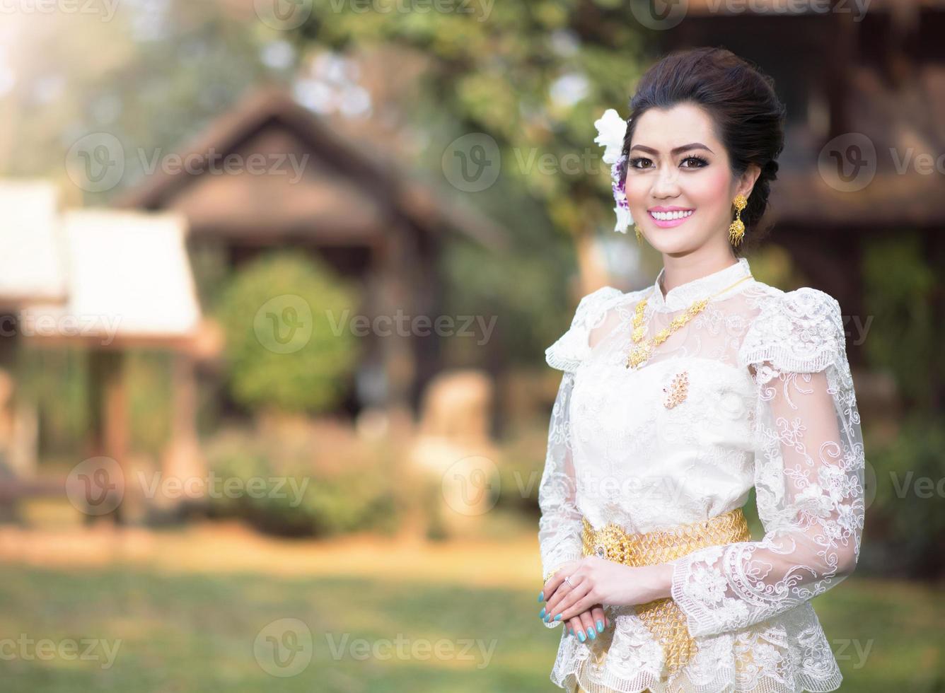 Beautiful Thai girl in Thai traditional costume photo