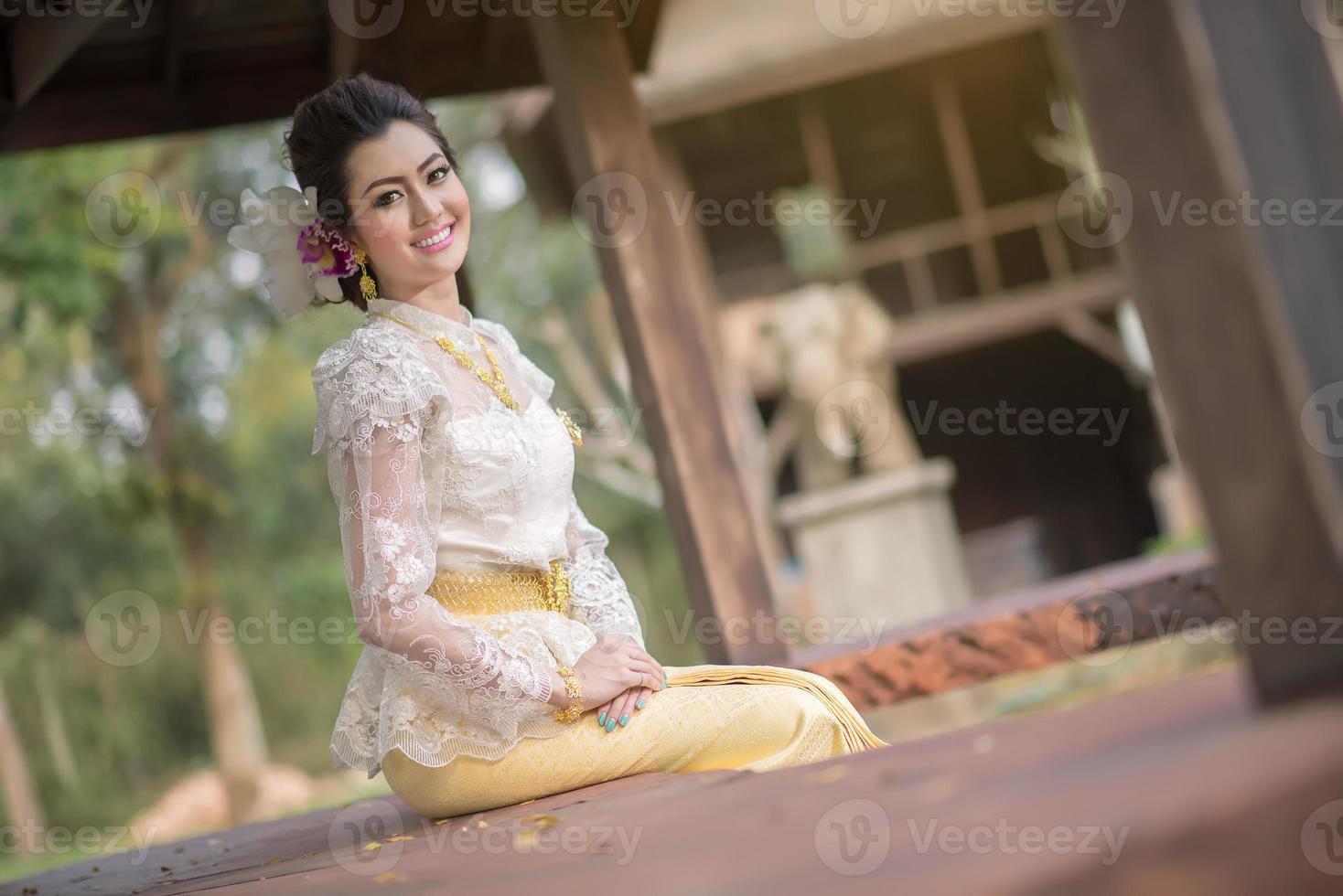 Beautiful Thai girl in Thai traditional costume photo