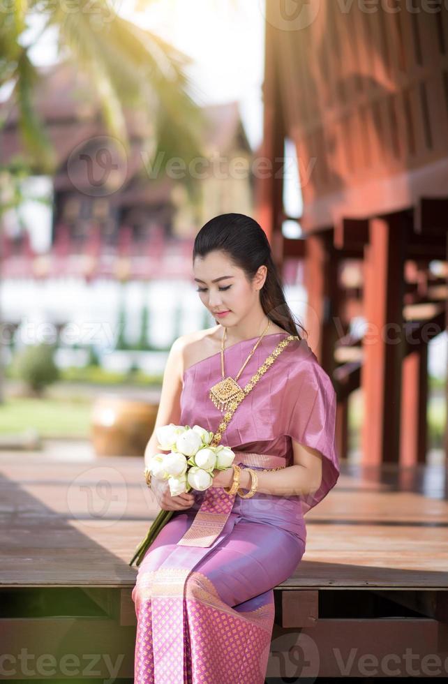 Beautiful Thai girl in Thai traditional costume photo