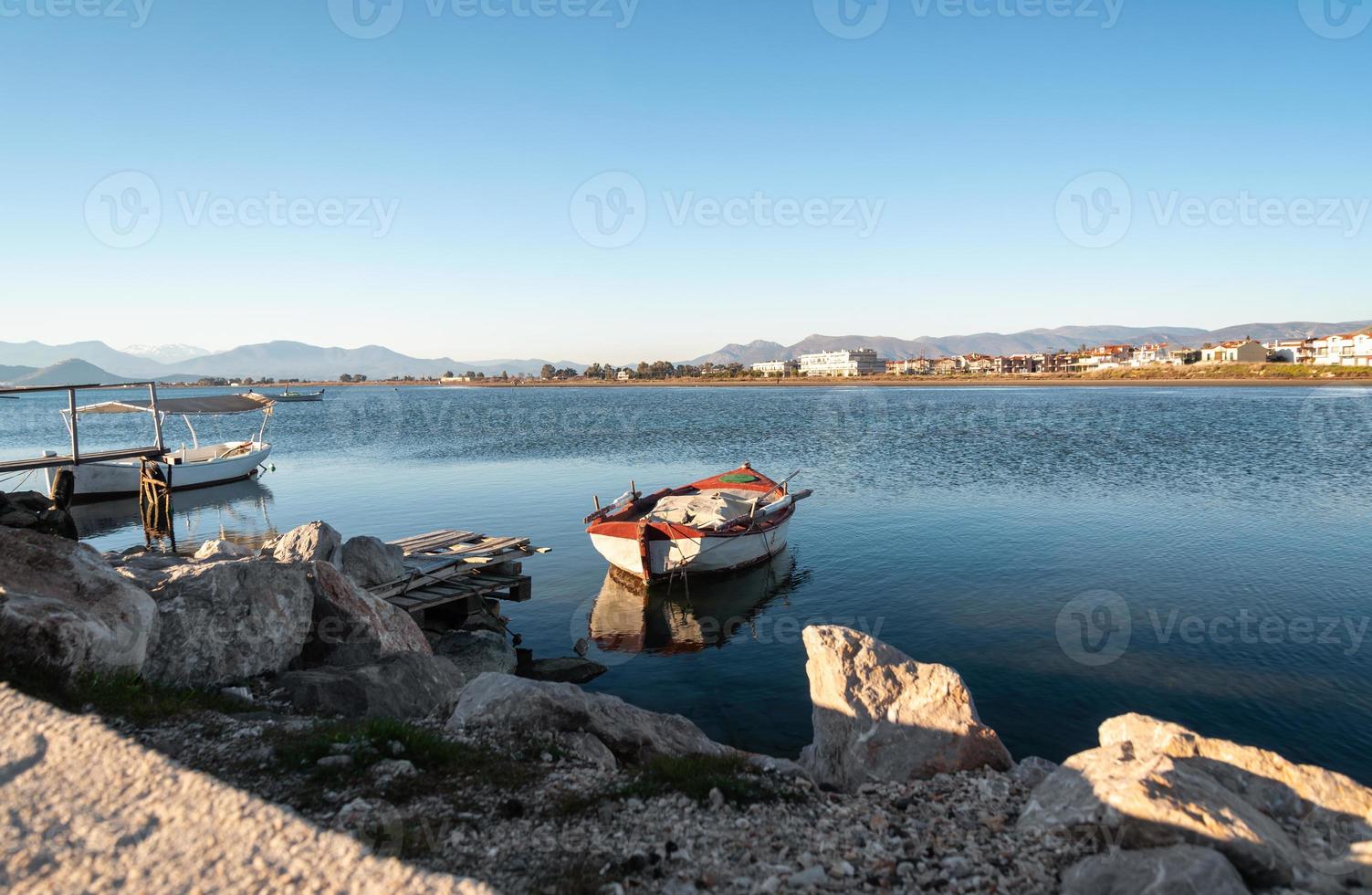 boat moored in the Aegean Sea in Greece photo