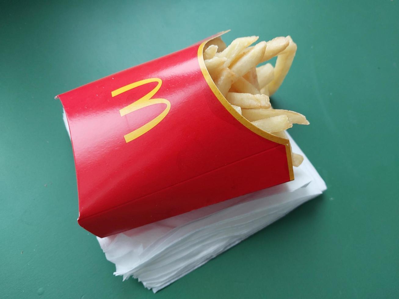 KYIV, UKRAINE - JANUARY 15, 2023 Food from McDonald's Big Mac with potatoes photo